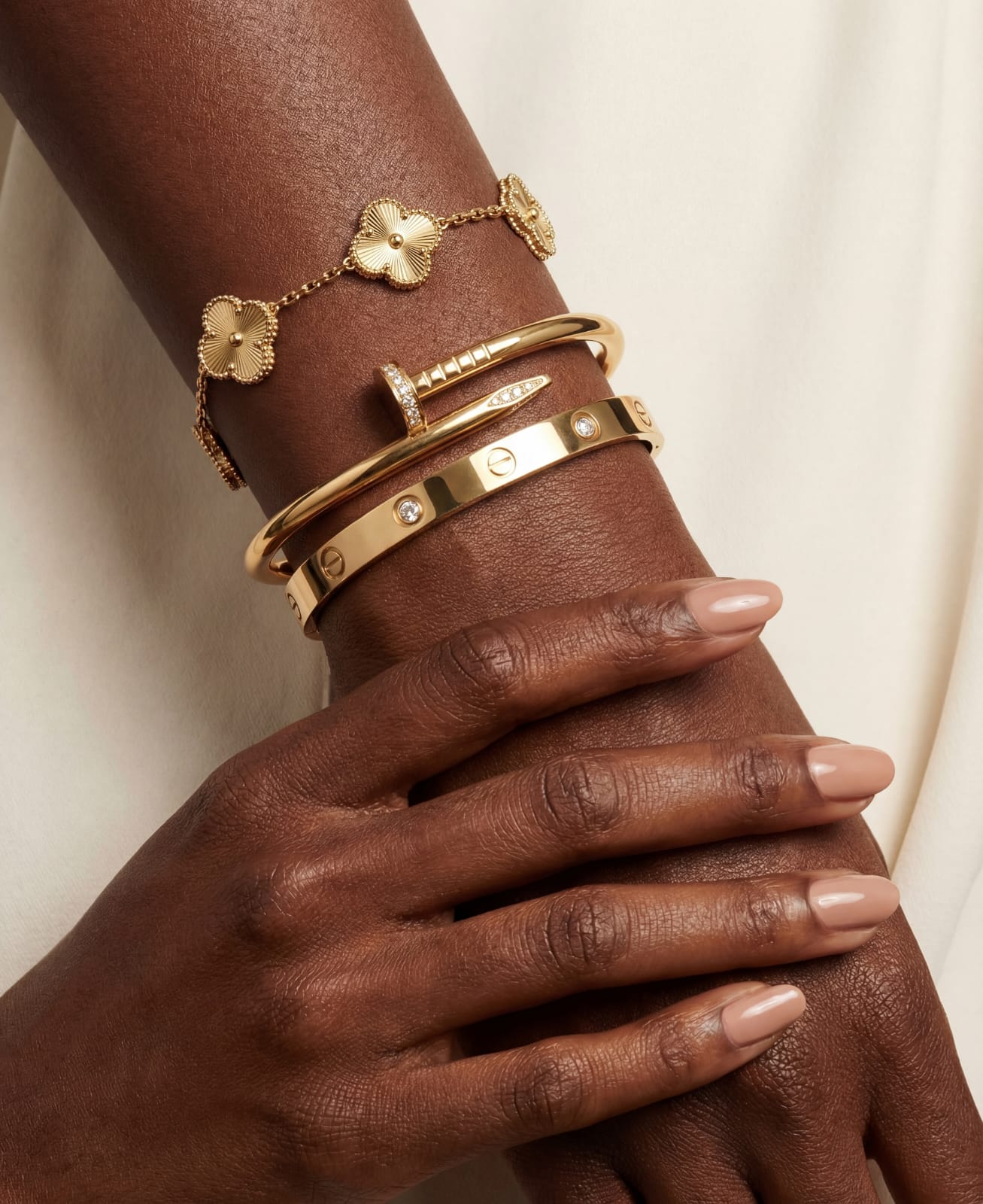 Woman wearing minimal gold bangle - waterproof stainless steel jewellery South Africa